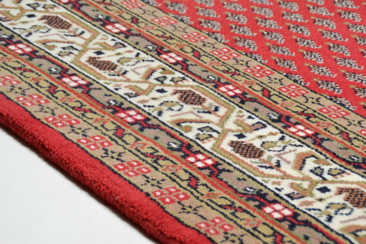 Theo Keller Handknüpfteppich rotbeige