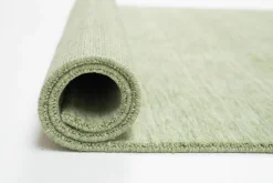 Theo Keller Handwebteppich grün